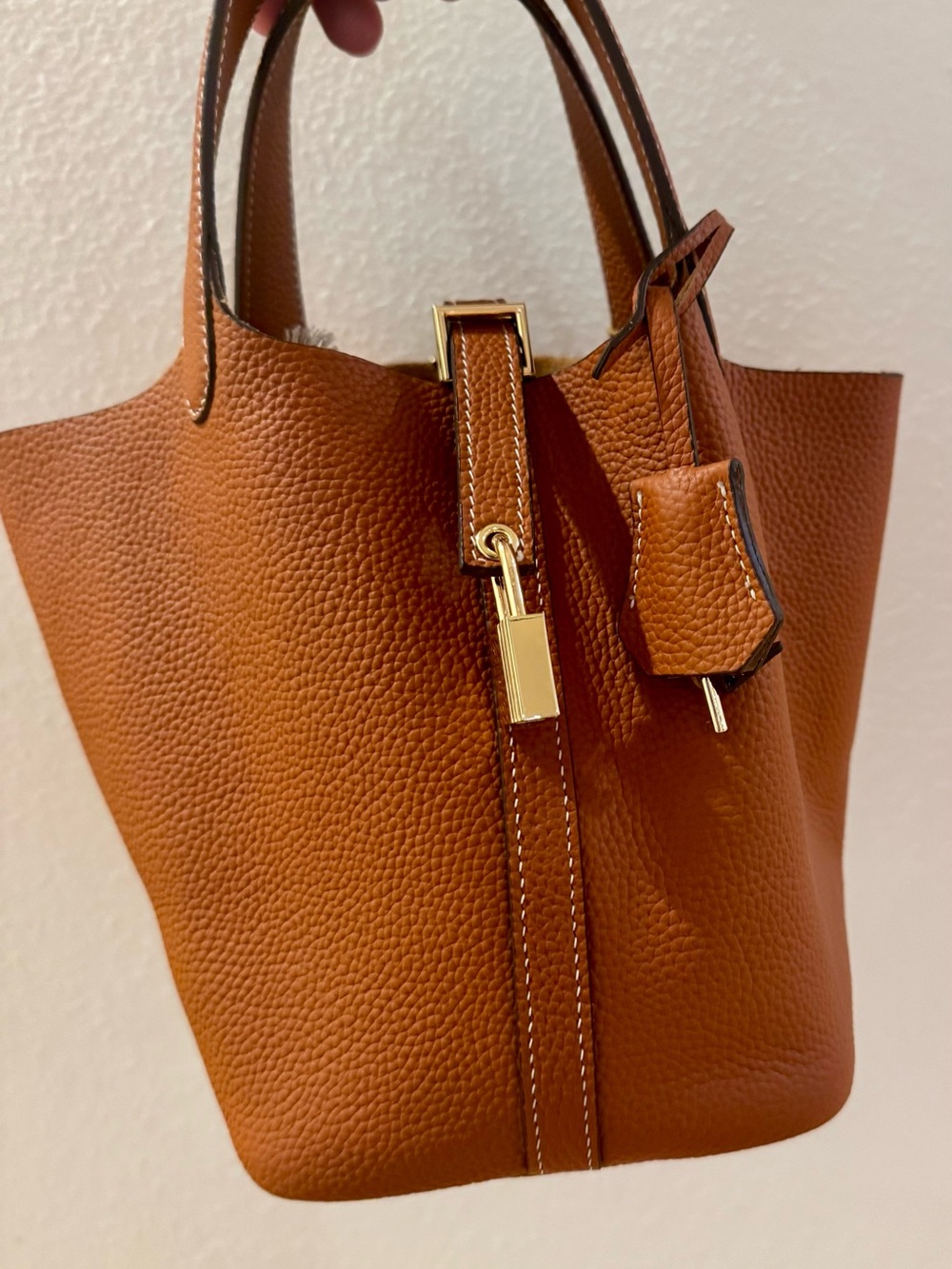 Leather Bucket Bag with lock, key, & clochette: Cognac Brown with Gold Hardware